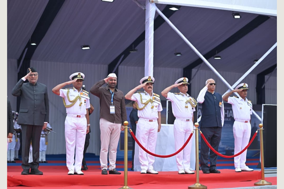 Officials saluting at the October 16 commissioning ceremony for INS Samarthak