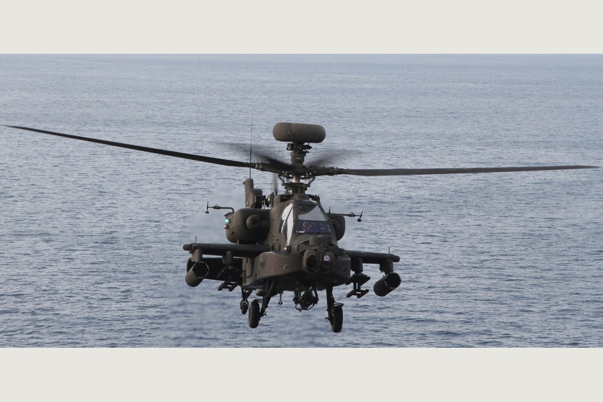 US Army AH-64E helicopter approaching USS Lewis B. Puller during an April 2020 exercise