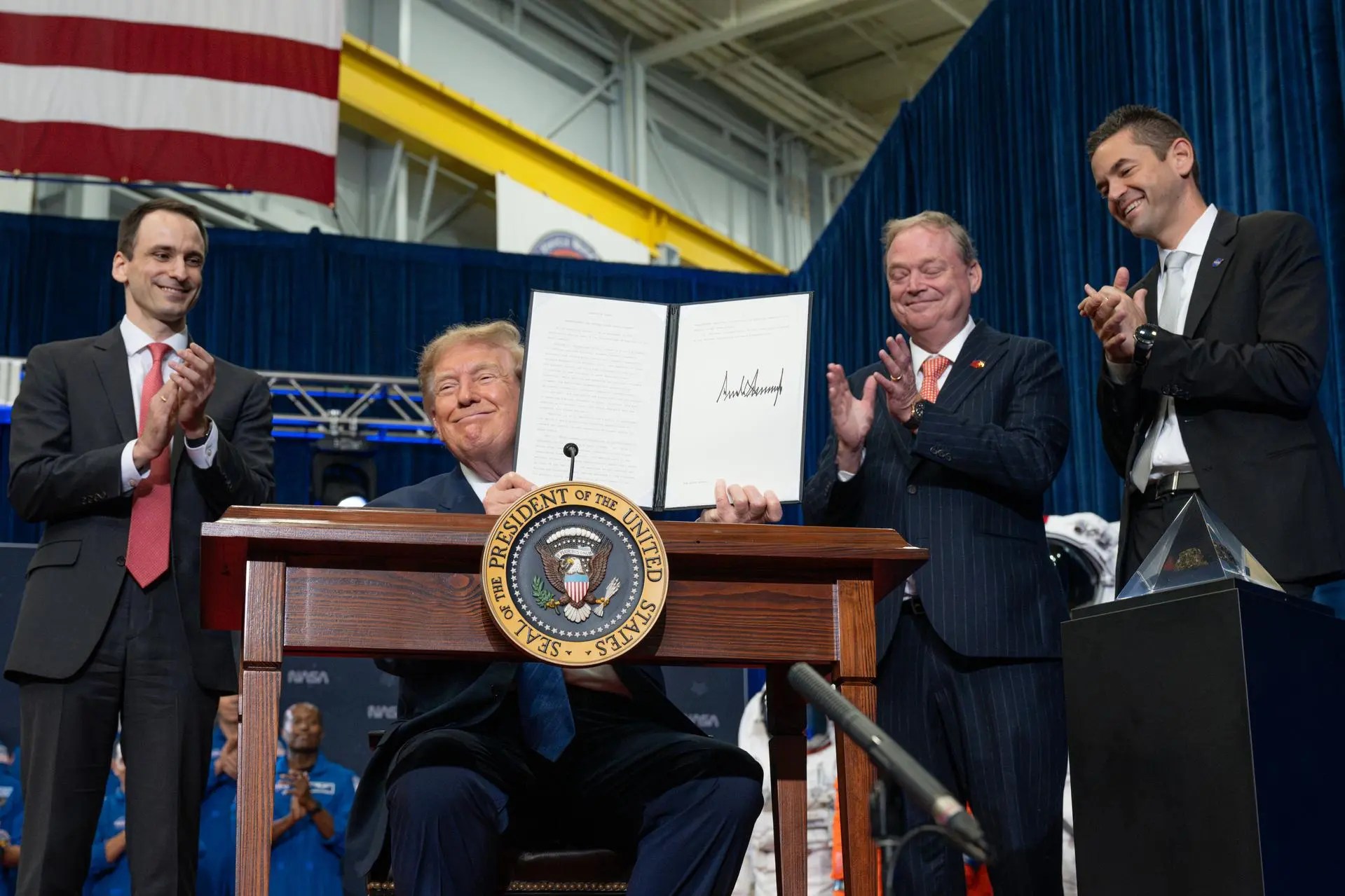 President Donald Trump presents the executive order establishing the United States Space Academy at NASA Johnson Space Center